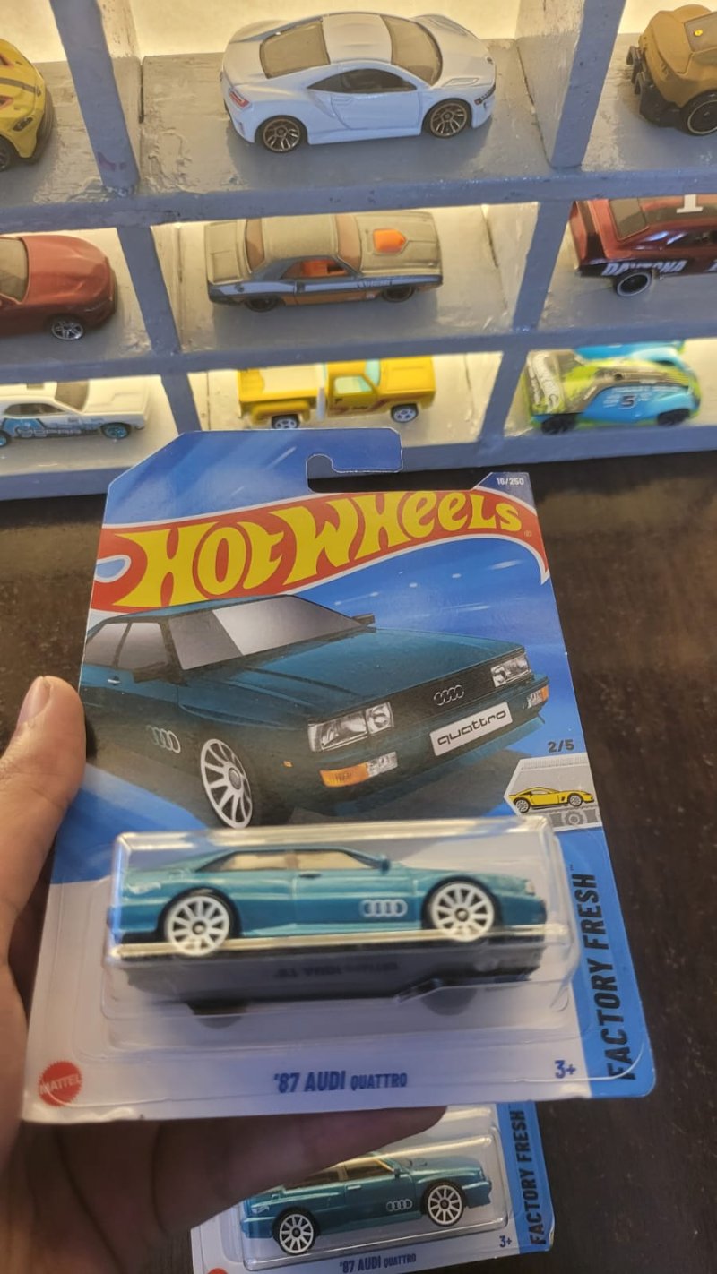Close-up of the wheels on Hot Wheels 1987 Audi Quattro Greenish Blue A Case