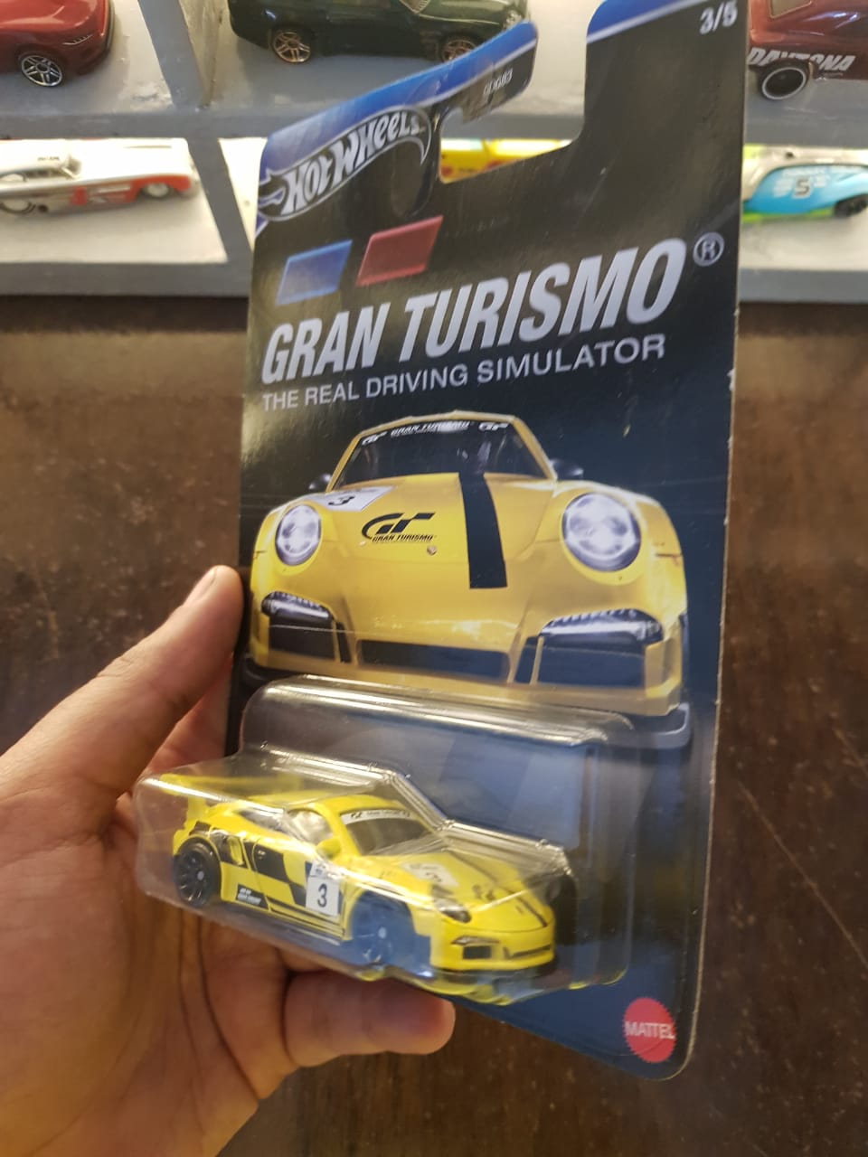 Angled view of Hot Wheels Gran Turismo Porsche 911 GT3 RS die-cast car
