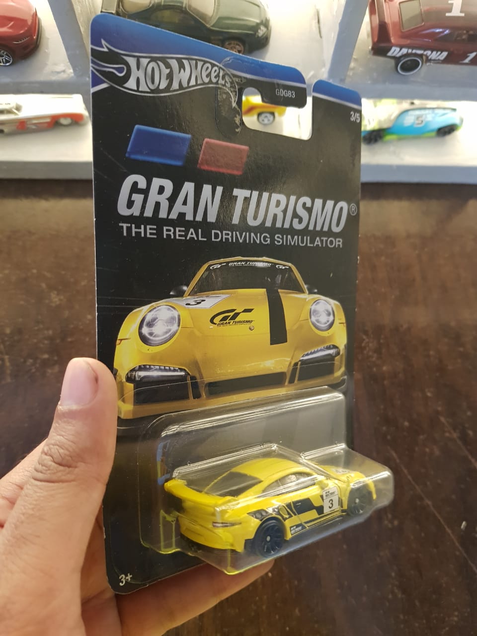 Rear view of Hot Wheels Gran Turismo Porsche 911 GT3 RS die-cast model