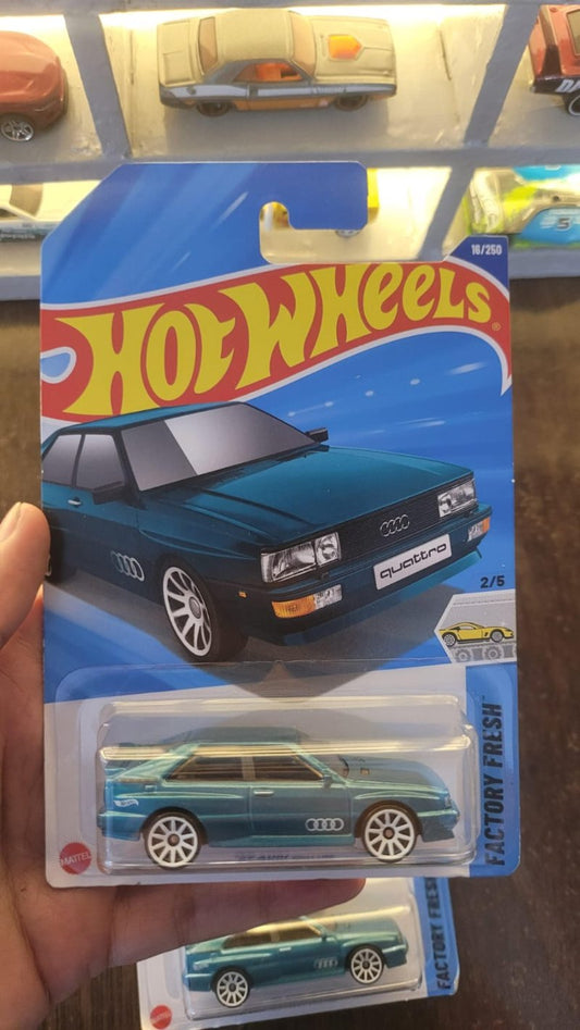 Hot Wheels 1987 Audi Quattro Greenish Blue A Case showcased in collector’s display