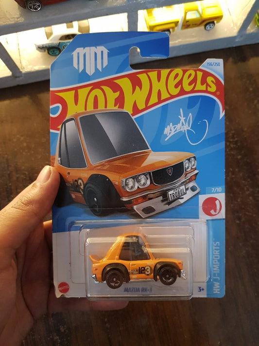 Front view of Hot Wheels Mazda RX-3 Orange die-cast model