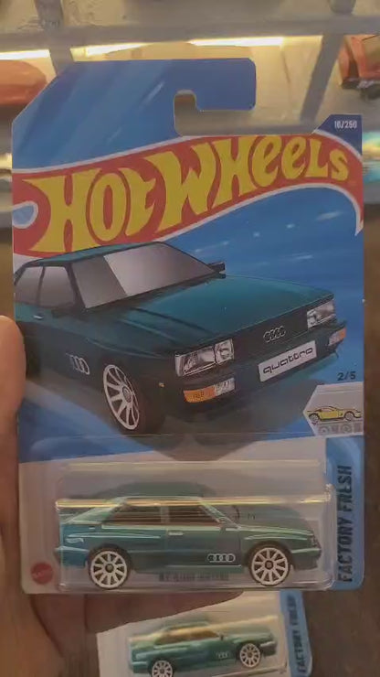 Overview of Hot Wheels 1987 Audi Quattro Greenish Blue A Case die-cast model