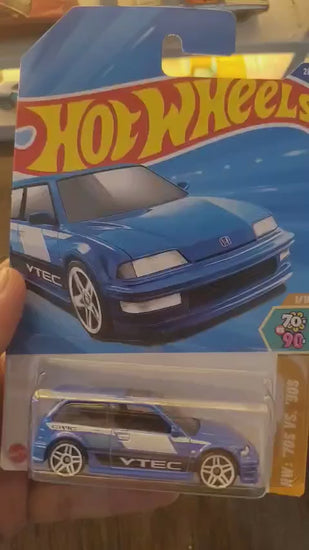 Detailed look at Hot Wheels Mainline 1990 Honda Civic EF die-cast model
