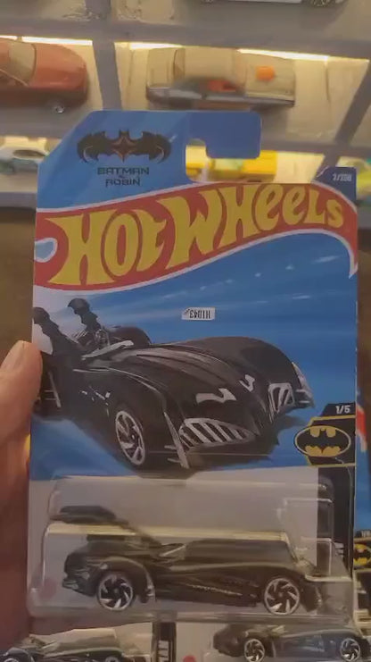 Showcase of Hot Wheels Batman and Robin Batmobile in black from multiple angles