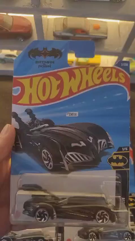Showcase of Hot Wheels Batman and Robin Batmobile in black from multiple angles