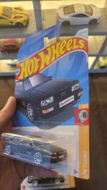 Angled view of Hot Wheels 1987 Audi Quattro Black Q Case die-cast model