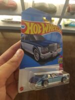 Rear view of Hot Wheels 82 Cadillac Seville die-cast vehicle