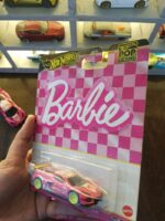 Hot Wheels Barbie '65 Corvette C8.R displayed on a shelf