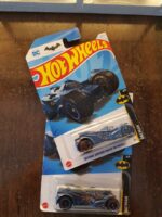 Hot Wheels Batman Arkham Knight Batmobile (Blue) displayed with other collectibles