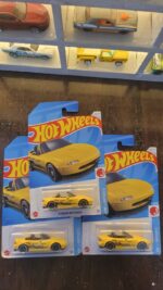 Hot Wheels Mainline 1991 Mazda MX-5 Miata among other cars in collection