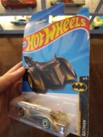 Hot Wheels Mainline Batmobile - Gold displayed in collection