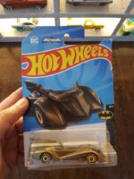Front view of Hot Wheels Mainline Batmobile - Gold Die-Cast Model