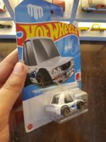 Rear view of Hot Wheels Mainline Mazda RX-3 White die-cast vehicle