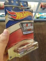 Rear view of Hot Wheels Stars and Stripes '64 Pontiac GTO collectible car