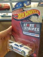 Angled view of Hot Wheels Stars and Stripes '68 Mercury Cougar die-cast model