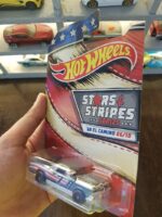 Angled view of Hot Wheels Stars and Stripes '68 El Camino die-cast model