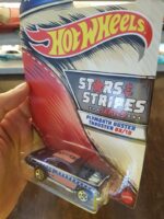 Angled view of Hot Wheels Stars and Stripes Plymouth Duster Thruster die-cast model