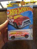 Front view of Hot Wheels Surf Duty die-cast beach patrol vehicle