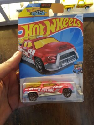 Front view of Hot Wheels Surf Duty die-cast beach patrol vehicle