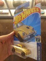 Angled view of Hot Wheels Transformers Bumblebee in gold die-cast model