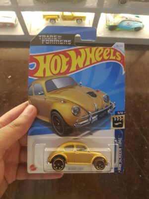 Front view of Hot Wheels Transformers Bumblebee in gold die-cast model
